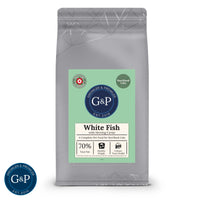Packaging of Growler and Prowler's White Fish with Herring Caviar cat food. The natural cat treat, produced by a Manchester-based company, features white fish and herring caviar as key ingredients, promoting healthy nutrition for pets.
